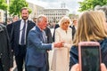 BERLIN, GERMANY - MAY 7, 2019: Charles, Prince of Wales and Camilla, Duchess of Cornwall, in front of Brandenburg Gate