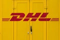 DHL logo on delivery truck car door. DHL is the global market leader in logistics industry. Royalty Free Stock Photo
