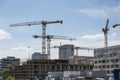 BERLIN, GERMANY, MAY 24, 2018: Many operating cranes at building site in Berlin Mitte Royalty Free Stock Photo