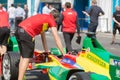 Mechanic checking a racing car