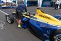 Mechanic checking a racing car