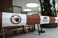 No entry icon on barrier tape at a Berlin zoo cafeteria after restricted reopening during coronavirus shutdown