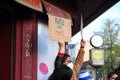 Berlin, Germany - May 01, 2021: A protester holding a placecard saying