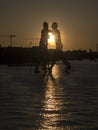 Molecule Man seen at sunset, Berlin, Germany