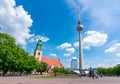 Berlin, Germany - May 2019: Saint Mary`s church St. Marienkirche and TV tower on Alexanderplatz square
