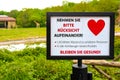 Social distancing sign in Berlin, Germany during the reopening phase of coronavirus shutdown