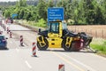 Traffic jam was formed because of the closed road during repair works on asphalt laying by road