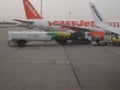 Easy Jet plane refueling on tarmac in Berlin Royalty Free Stock Photo