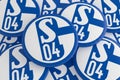 German Bundesliga Badges: Pile of Schalke 04 Logo Buttons, 3D Illustration