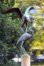 Berlin, Germany - November 9, 2023: Sculpture of two storks in Monbijoupark, a park in Mitte district of Berlin