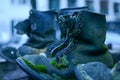 Old army boots under the blue hour Royalty Free Stock Photo