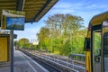 Platform of the Berlin S-Bahn at Berlin-Lichtenrade station. On the right you can see the cab, which is reflected in the mirror at Royalty Free Stock Photo