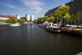9.7.2017 BERLIN GERMANY Old harbor with old ships at the riverside in Berlin, Germany. In The background is the berlin TV-Tower Royalty Free Stock Photo