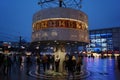 Berlin, Germany: people around the Urania World Clock in Alexanderplatz