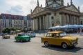 Berlin, Germany: Retro cars on the street. Gendarmenmarkt square with Berlin Concert Hall and German Cathedral