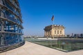 Berlin, Germany - Rooftop of the Reichstag building with the glass panoramic Bundestag dome and historic corner tower with Germany Royalty Free Stock Photo