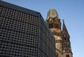 Broken tower of Kaiser Wilhelm Memorial Church Gedachtniskirche with belfry in front - church was not rebuild as a reminder of w