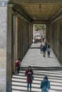 BERLIN, GERMANY - SEPTEMBER 26, 2018: Downwards and in depth perspective of Berliners walking under a construction at