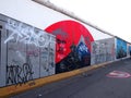 BERLIN, GERMANY - SEPTEMBER 22: Graffiti on Berlin Wall at East Side Gallery on September 22, 2014 in Berlin Royalty Free Stock Photo