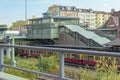 Historic station building of the Berlin public transport with a train, which stands straight at the platform