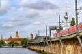 Railway arcades at the river Spree in the center of Berlin. In the background you can see the Red Town Hall, the Alexander Tower a