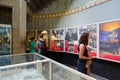 Tourists are visiting exposition about history of Kaiser Wilhelm Memorial Church in old part of temple, Berlin, Germany