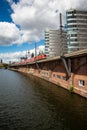 Berlin, Germany. Spree riverfront and railway bridge