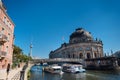 Berlin government district with Bode museum and ship on Spree rive