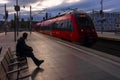 Berlin main train station 31-08-2018 View of the platform of the main train yard in the early dawn, a train enters the station, on