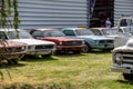 Various Ford Mustang first generation stand in a row Royalty Free Stock Photo