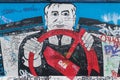 BERLIN - OCTOBER 19, 2016: Artwork depicting communism on the Berlin Wall
