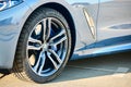 Berlin - October 2021: BMW 8 Series G16 Gran Coupe 840i xDrive M-pack car closeup alloy wheel with Pirelli r19 p zero