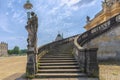 Berlin Potsdam park Sansouci. View of the stone staircase, with the statue of the lady with child and lamp at the entrance of one