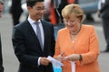 BERLIN - SEP 11: Philipp RÃÂ¶sler and Angela Merkel