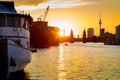 Berlin skyline with old ship wreck in Spree river at sunset, Germany Royalty Free Stock Photo