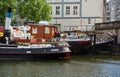 Berlin, Spree river, Germany. Old river ships at the embankment