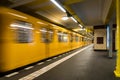 Berlin Subway metro underground - Yellow Train moving - nobody background Royalty Free Stock Photo