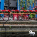 Berlin terras red chairs on the Spree river Royalty Free Stock Photo