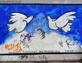 Berlin Wall East Side Gallery dove graffiti Royalty Free Stock Photo