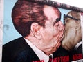 BERLIN WALL - Kiss between Brezhnev and Honecker painting on Berlin Wall at East Side Gallery September 22, 2014 in Berlin