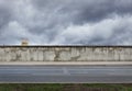 Berlin Wall with watchtower from the time of the Cold War