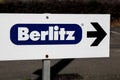 Berlitz logo on a signpost