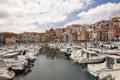 Bermeo, Basque Country, Spain - July 16, 2020: fishing port with colorful facades of houses and fishing boats against the backdrop