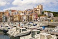 Bermeo, Basque Country, Spain - July 16, 2020: fishing port with colorful facades of houses and fishing boats against