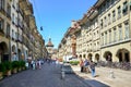 Bern, Switzerland - August 14, 2019: People walking in the old town of the Swiss capital. Famous Kramgasse with astronomical clock Royalty Free Stock Photo