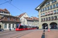 Bern, Switzerland - August 14, 2019: Red tram on the street in the city center of the Swiss capital. Public transport. Historical