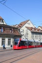 Bern, Switzerland - August 14, 2019: Red tram on the street in the city center of the Swiss capital. Public transport. Trams,