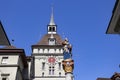 View of Anna Seiler fountain with the Kafigturm clock tower on the background in the center