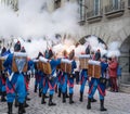 Firegun shots fired by soldiers on traditional costume during a Parade on Zibelemarit Holiday Onion Market - Bern, Switzerland Royalty Free Stock Photo