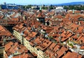 View of the historic part of Bern with buildings with red roofs and the Zytglogge astronomical clock tower in Switzerland
